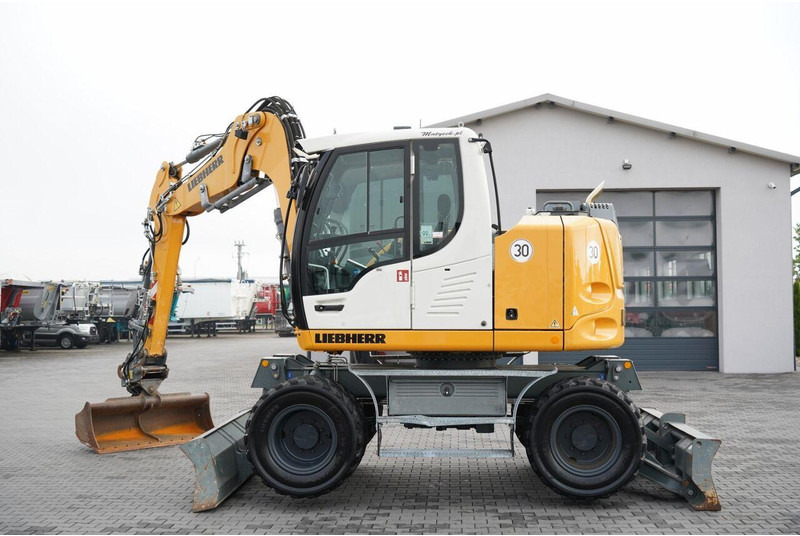 Liebherr 910 COMPACT LITRONIC / KOPARKA KOŁOWA / KLIMATYZACJA / KAMERA - Τροχοφόρος εκσκαφέας: φωτογραφία 2 Liebherr 910 COMPACT LITRONIC / KOPARKA KOŁOWA / KLIMATYZACJA / KAMERA - Τροχοφόρος εκσκαφέας: φωτογραφία 2