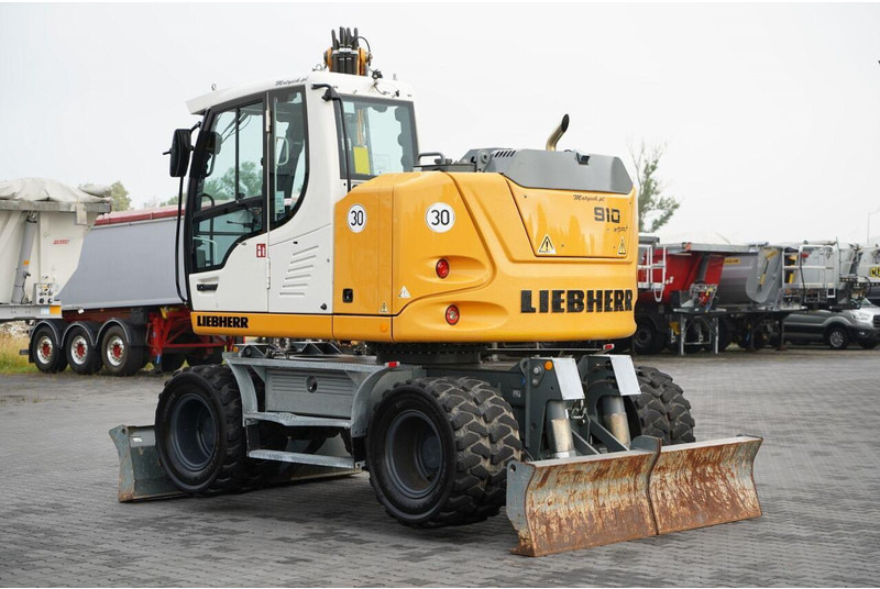 Liebherr 910 COMPACT LITRONIC / KOPARKA KOŁOWA / KLIMATYZACJA / KAMERA - Τροχοφόρος εκσκαφέας: φωτογραφία 3 Liebherr 910 COMPACT LITRONIC / KOPARKA KOŁOWA / KLIMATYZACJA / KAMERA - Τροχοφόρος εκσκαφέας: φωτογραφία 3