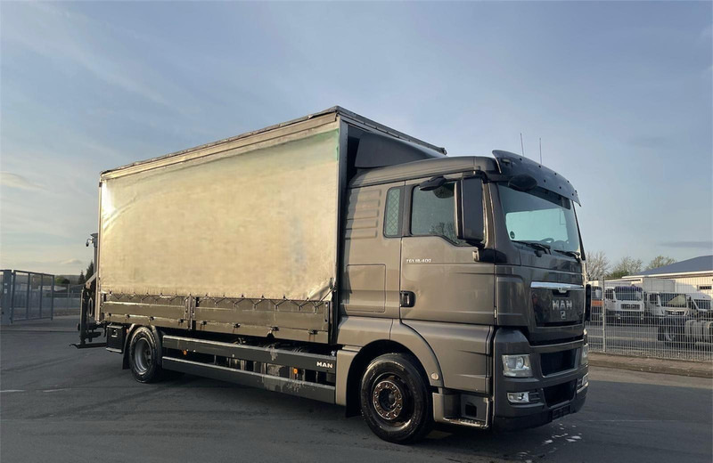 MAN TGX 18.400 Curtain Sider + Crane Palfinger 14002 EH - Φορτηγό κόφα: φωτογραφία 1 MAN TGX 18.400 Curtain Sider + Crane Palfinger 14002 EH - Φορτηγό κόφα: φωτογραφία 1