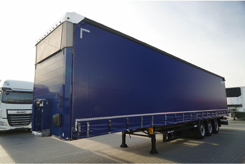 Schmitz Cargobull VARIOS / PODNOSZONY DACH HYDRAULICZNIE / OPONY 385/55 R22,5 / 20 - Επικαθήμενο κουρτίνα: φωτογραφία 2 Schmitz Cargobull VARIOS / PODNOSZONY DACH HYDRAULICZNIE / OPONY 385/55 R22,5 / 20 - Επικαθήμενο κουρτίνα: φωτογραφία 2