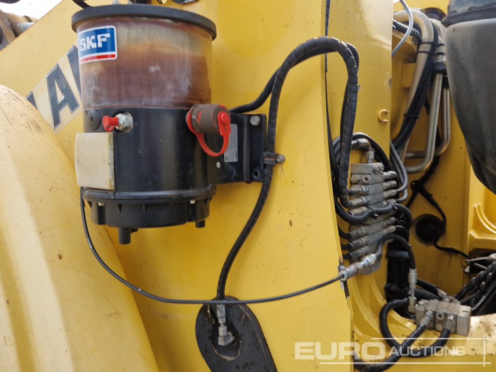 Ελαστιχοφόρος φορτωτής 2011 New Holland W230C: φωτογραφία 26