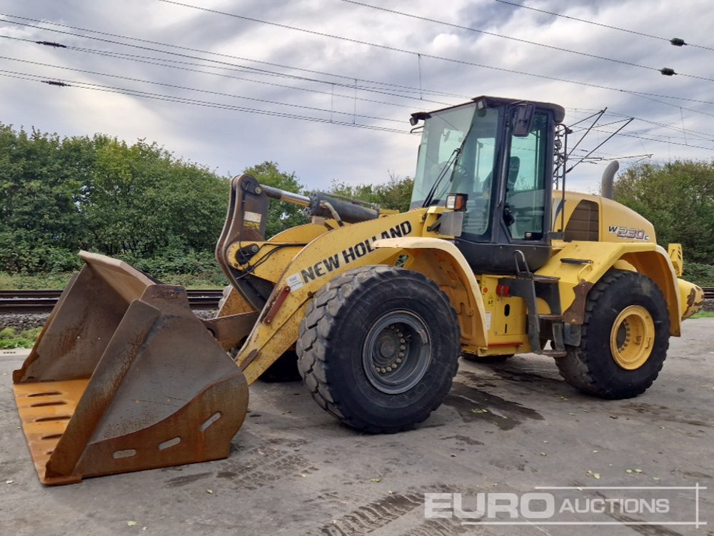 2011 New Holland W230C - Ελαστιχοφόρος φορτωτής: φωτογραφία 1 2011 New Holland W230C - Ελαστιχοφόρος φορτωτής: φωτογραφία 1