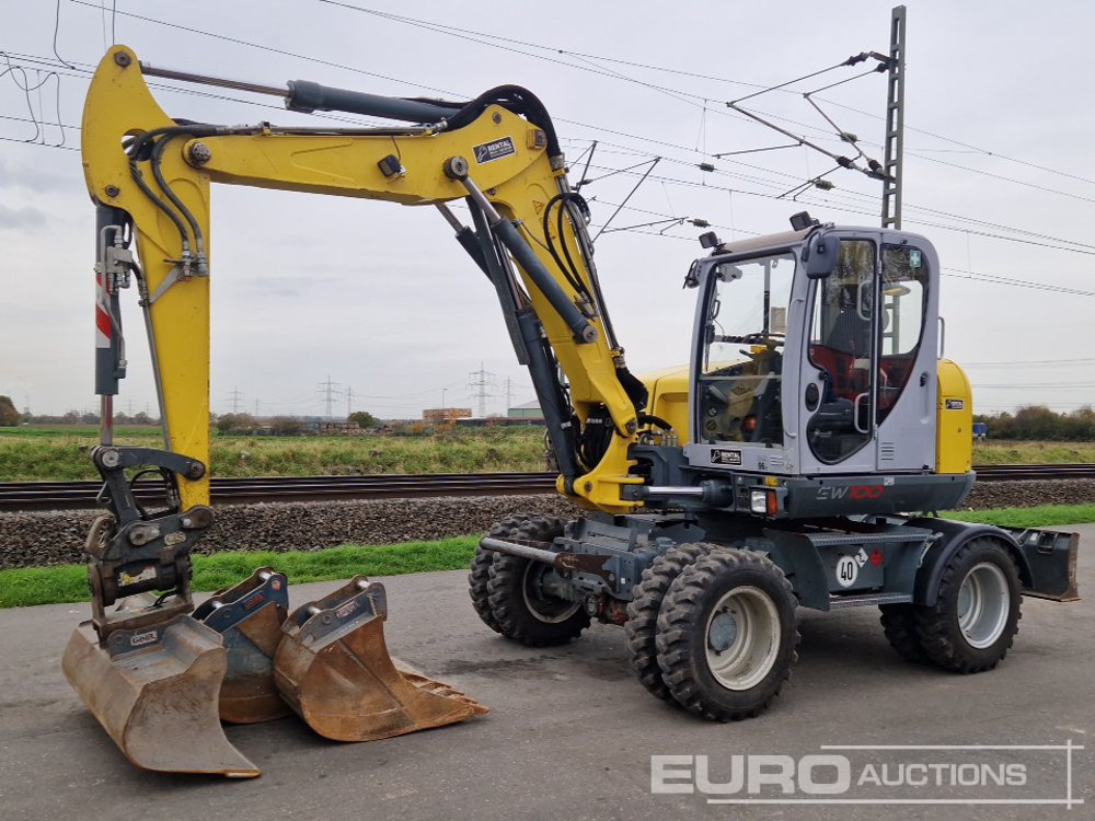 2016 Wacker Neuson EW100 - Τροχοφόρος εκσκαφέας: φωτογραφία 1 2016 Wacker Neuson EW100 - Τροχοφόρος εκσκαφέας: φωτογραφία 1
