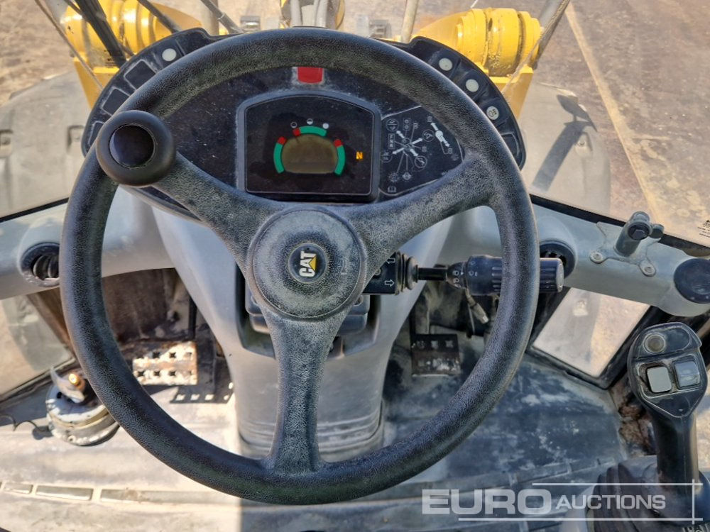 Ελαστιχοφόρος φορτωτής 2010 CAT 908H: φωτογραφία 22