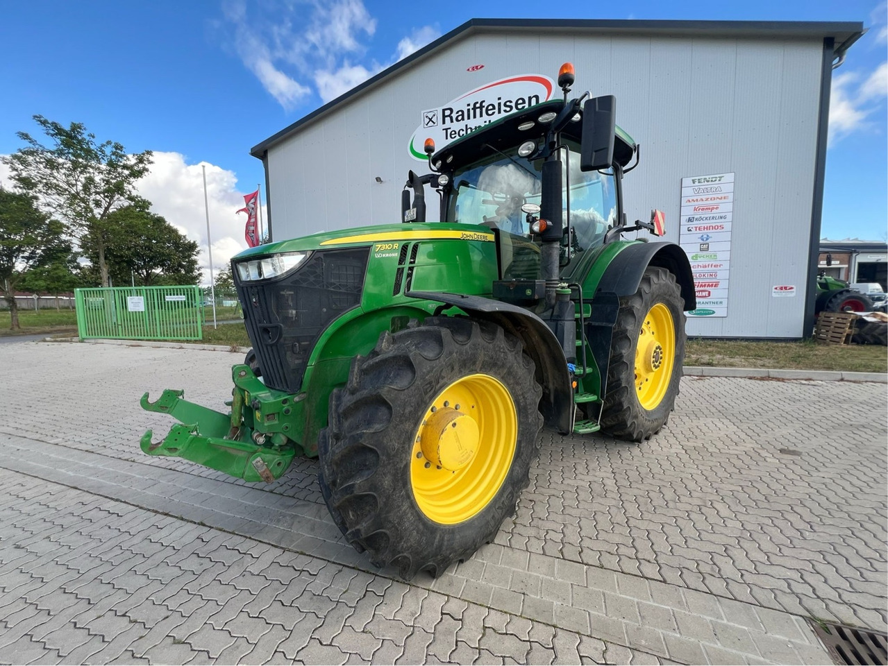 John Deere 7310 R - Τρακτέρ: φωτογραφία 1 John Deere 7310 R - Τρακτέρ: φωτογραφία 1