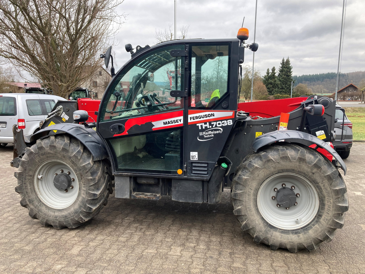 Massey Ferguson Telekoplader TH 7038 - Τηλεσκοπικός φορτωτής: φωτογραφία 1 Massey Ferguson Telekoplader TH 7038 - Τηλεσκοπικός φορτωτής: φωτογραφία 1