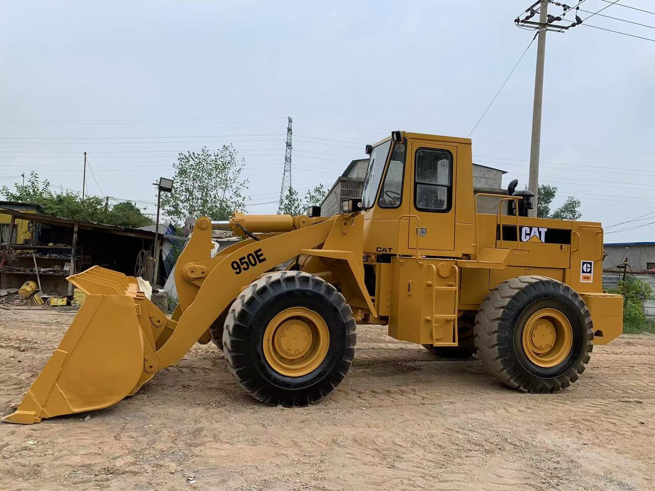 CATERPILLAR 950E - Ελαστιχοφόρος φορτωτής: φωτογραφία 3 CATERPILLAR 950E - Ελαστιχοφόρος φορτωτής: φωτογραφία 3