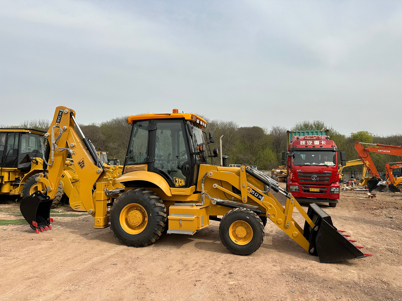 JCB 3CX - Φορτωτής εκσκαφέας: φωτογραφία 1 JCB 3CX - Φορτωτής εκσκαφέας: φωτογραφία 1