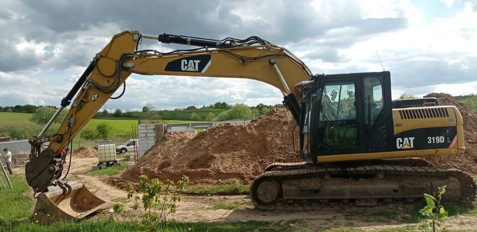 Ερπυστριοφόρος εκσκαφέας Caterpillar 319 D: φωτογραφία 1