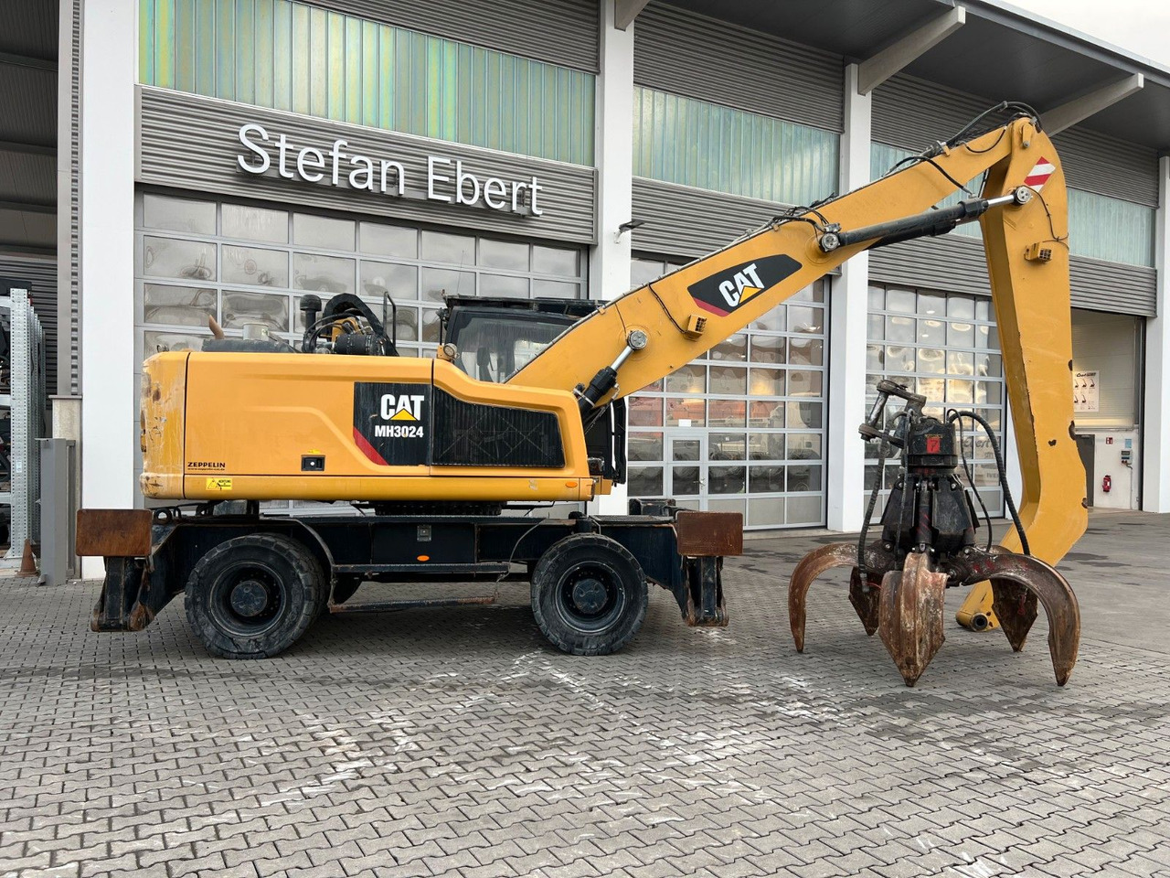 CAT MH3024 / MH 3024 / Greifer / 2018 / 10.735h - Τροχοφόρος εκσκαφέας: φωτογραφία 3 CAT MH3024 / MH 3024 / Greifer / 2018 / 10.735h - Τροχοφόρος εκσκαφέας: φωτογραφία 3