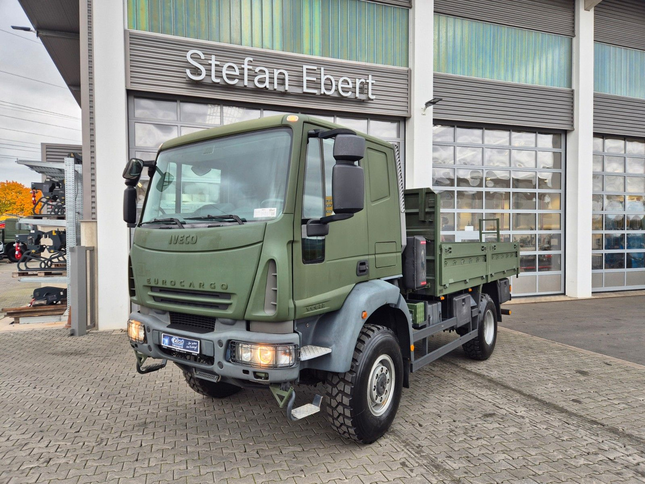 Iveco Eurocargo ML100E22WM-BW 4x4 Pritsche L-Haus Bett - Φορτηγό με ανοιχτή καρότσα: φωτογραφία 3 Iveco Eurocargo ML100E22WM-BW 4x4 Pritsche L-Haus Bett - Φορτηγό με ανοιχτή καρότσα: φωτογραφία 3