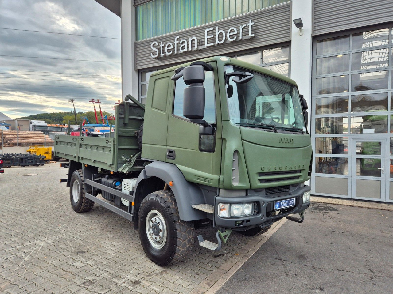 Iveco Eurocargo ML100E22WM-BW 4x4 Pritsche L-Haus Bett - Φορτηγό με ανοιχτή καρότσα: φωτογραφία 2 Iveco Eurocargo ML100E22WM-BW 4x4 Pritsche L-Haus Bett - Φορτηγό με ανοιχτή καρότσα: φωτογραφία 2