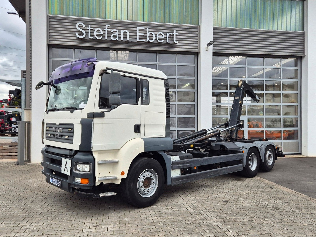 MAN TGA 26.440 6x2-2 BL Meiller RK 20.70 Bett - Φορτηγό φόρτωσης γάντζου: φωτογραφία 1 MAN TGA 26.440 6x2-2 BL Meiller RK 20.70 Bett - Φορτηγό φόρτωσης γάντζου: φωτογραφία 1