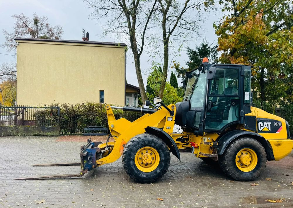 Caterpillar 907H - Ελαστιχοφόρος φορτωτής: φωτογραφία 4 Caterpillar 907H - Ελαστιχοφόρος φορτωτής: φωτογραφία 4