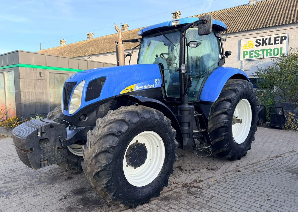 New Holland T7050 - Τρακτέρ: φωτογραφία 1 New Holland T7050 - Τρακτέρ: φωτογραφία 1