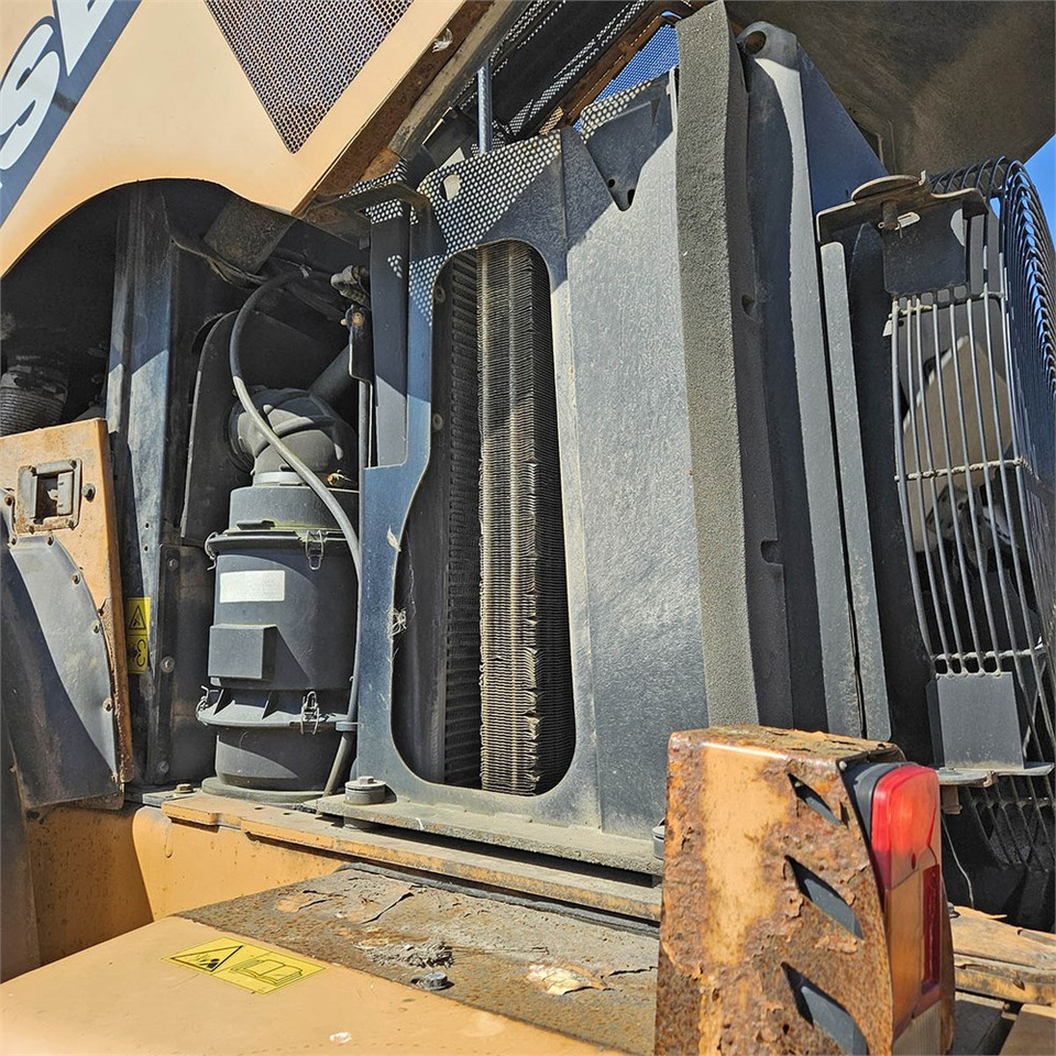 Ελαστιχοφόρος φορτωτής Case 921 E: φωτογραφία 37
