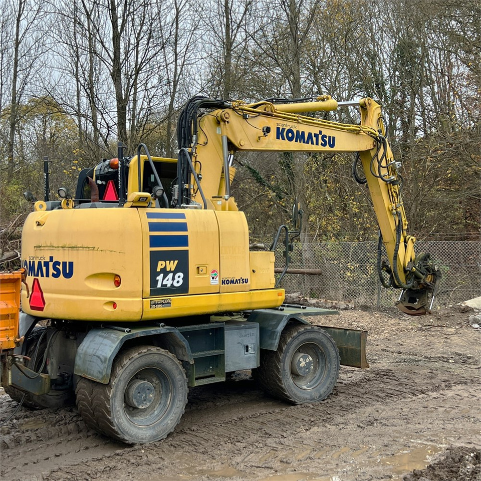 Komatsu PW148-10 - Τροχοφόρος εκσκαφέας: φωτογραφία 1 Komatsu PW148-10 - Τροχοφόρος εκσκαφέας: φωτογραφία 1