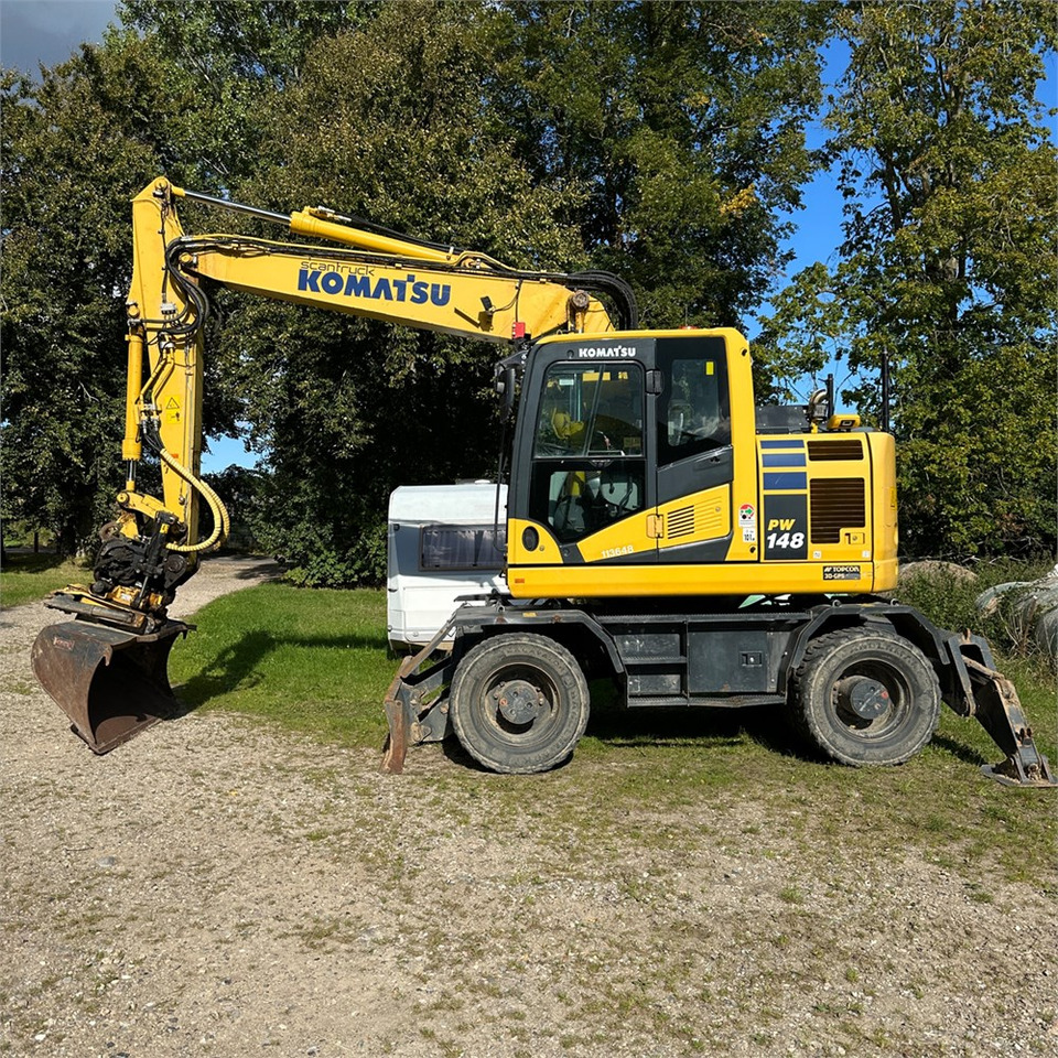 Komatsu PW148-11 - Τροχοφόρος εκσκαφέας: φωτογραφία 1 Komatsu PW148-11 - Τροχοφόρος εκσκαφέας: φωτογραφία 1