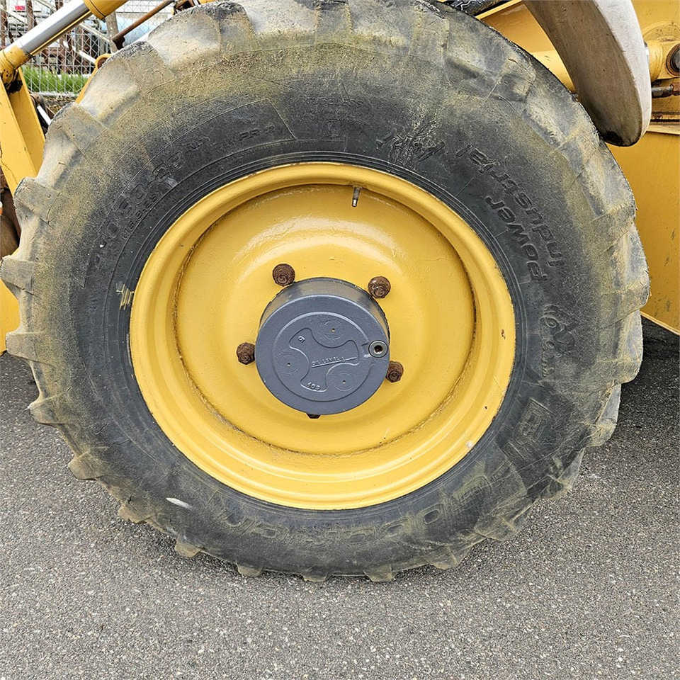 Φορτωτής εκσκαφέας New Holland LB115: φωτογραφία 37