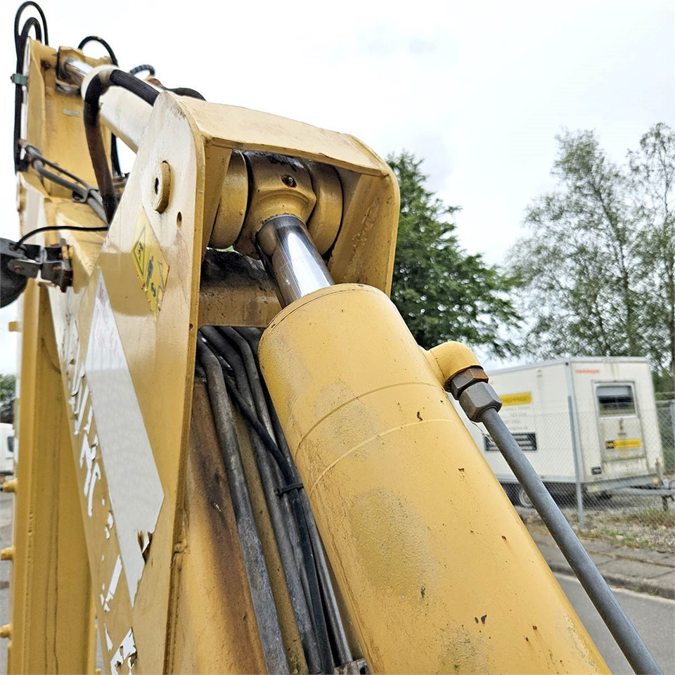 Φορτωτής εκσκαφέας New Holland LB115: φωτογραφία 27
