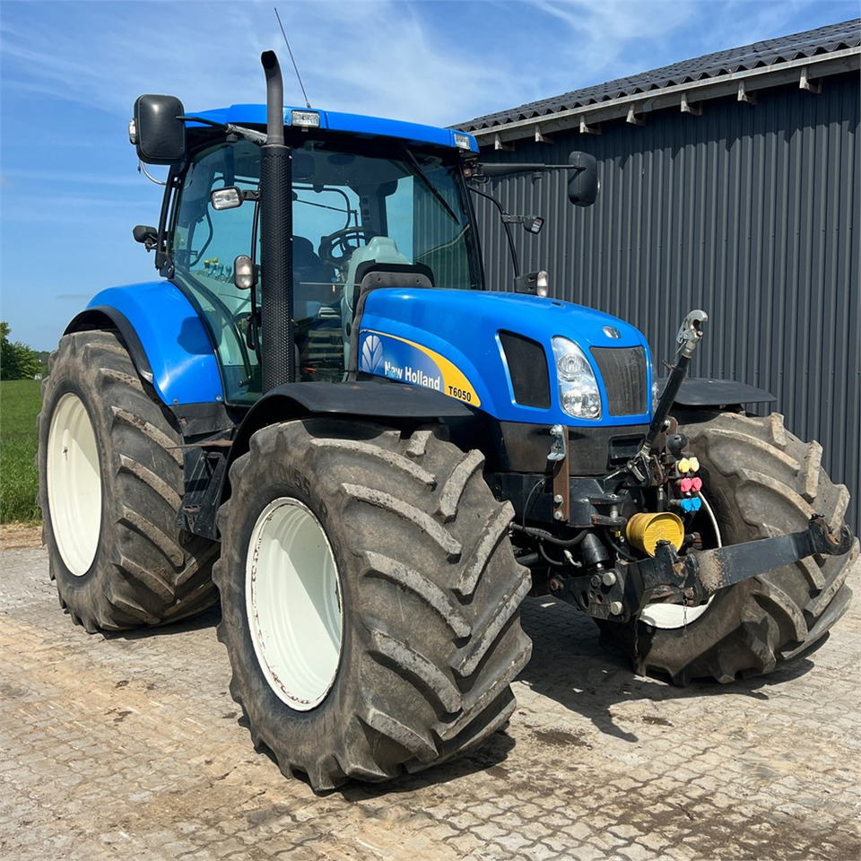 New Holland T6050 - Τρακτέρ: φωτογραφία 1 New Holland T6050 - Τρακτέρ: φωτογραφία 1
