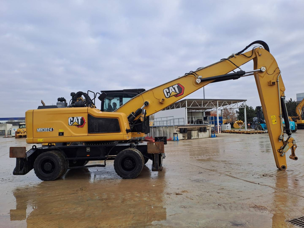 Τροχοφόρος εκσκαφέας CAT MH3024: φωτογραφία 8 Τροχοφόρος εκσκαφέας CAT MH3024: φωτογραφία 8