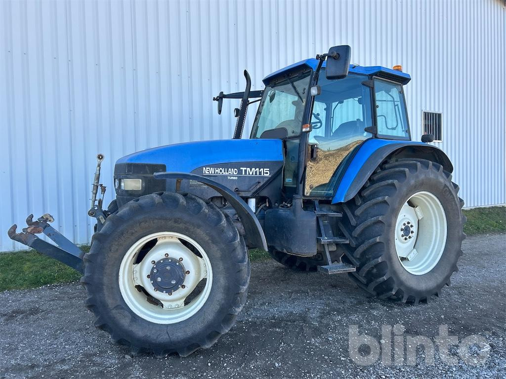 New Holland TM115 (2001) - Τρακτέρ: φωτογραφία 1 New Holland TM115 (2001) - Τρακτέρ: φωτογραφία 1
