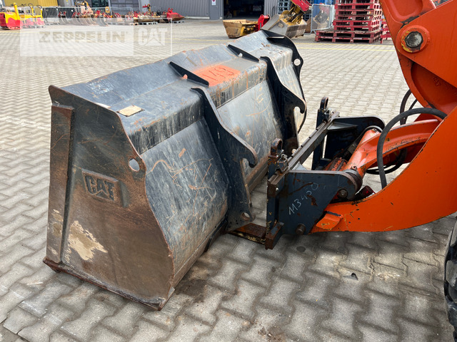 Ελαστιχοφόρος φορτωτής Cat 908H: φωτογραφία 16 Ελαστιχοφόρος φορτωτής Cat 908H: φωτογραφία 16