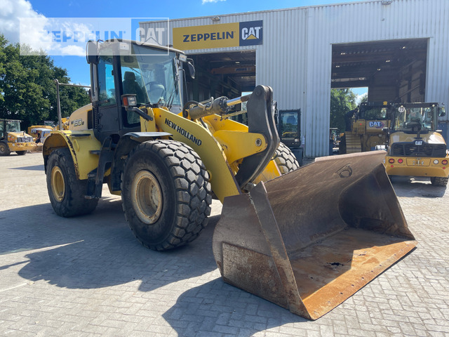 New Holland W190 - Ελαστιχοφόρος φορτωτής: φωτογραφία 1 New Holland W190 - Ελαστιχοφόρος φορτωτής: φωτογραφία 1